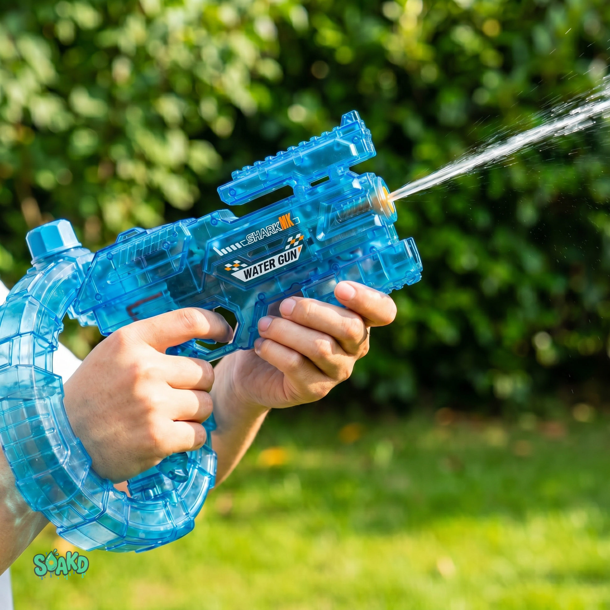 Kid firing Soakd full-auto electric water blaster outdoors